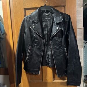 Black rivet faux leather jacket